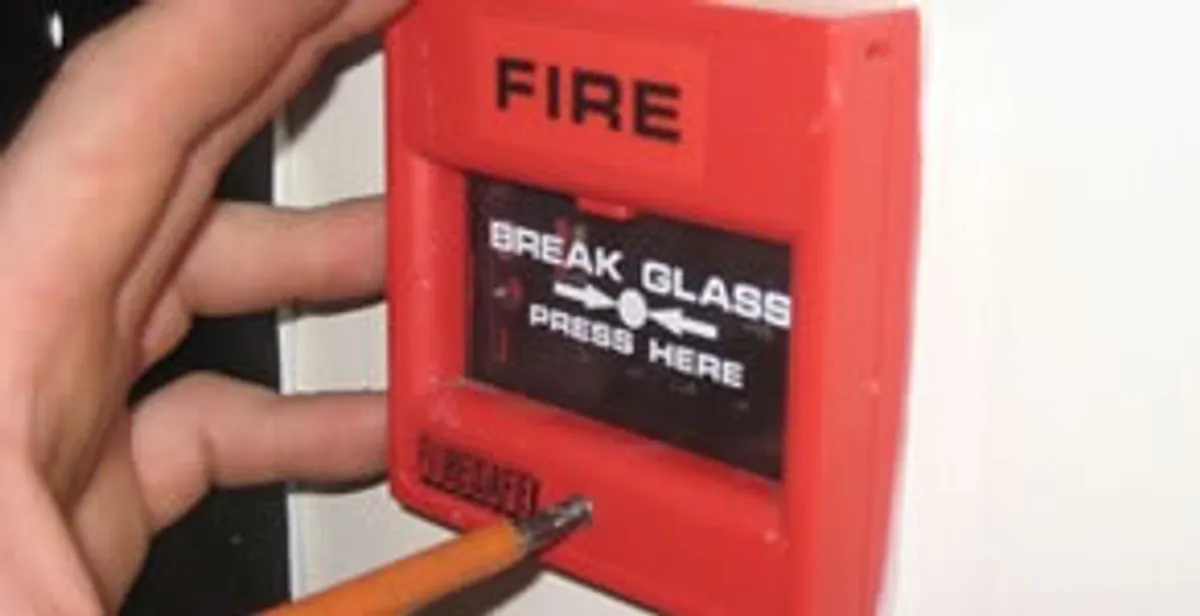 fire alarm installation service showing manual fire alarm pull station installed by licensed electricians in Savannah, GA